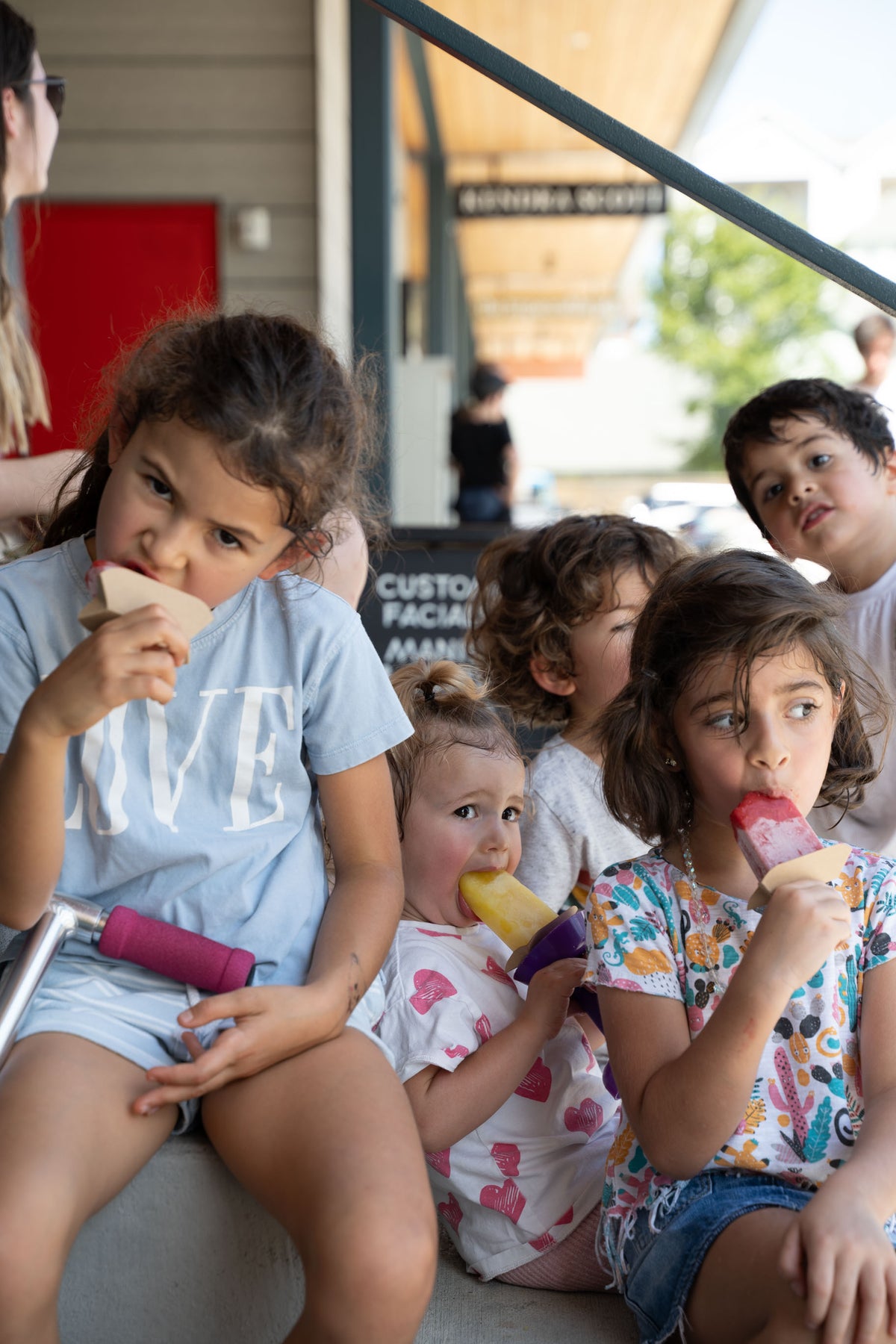 kids having frozen dessert on catering event 