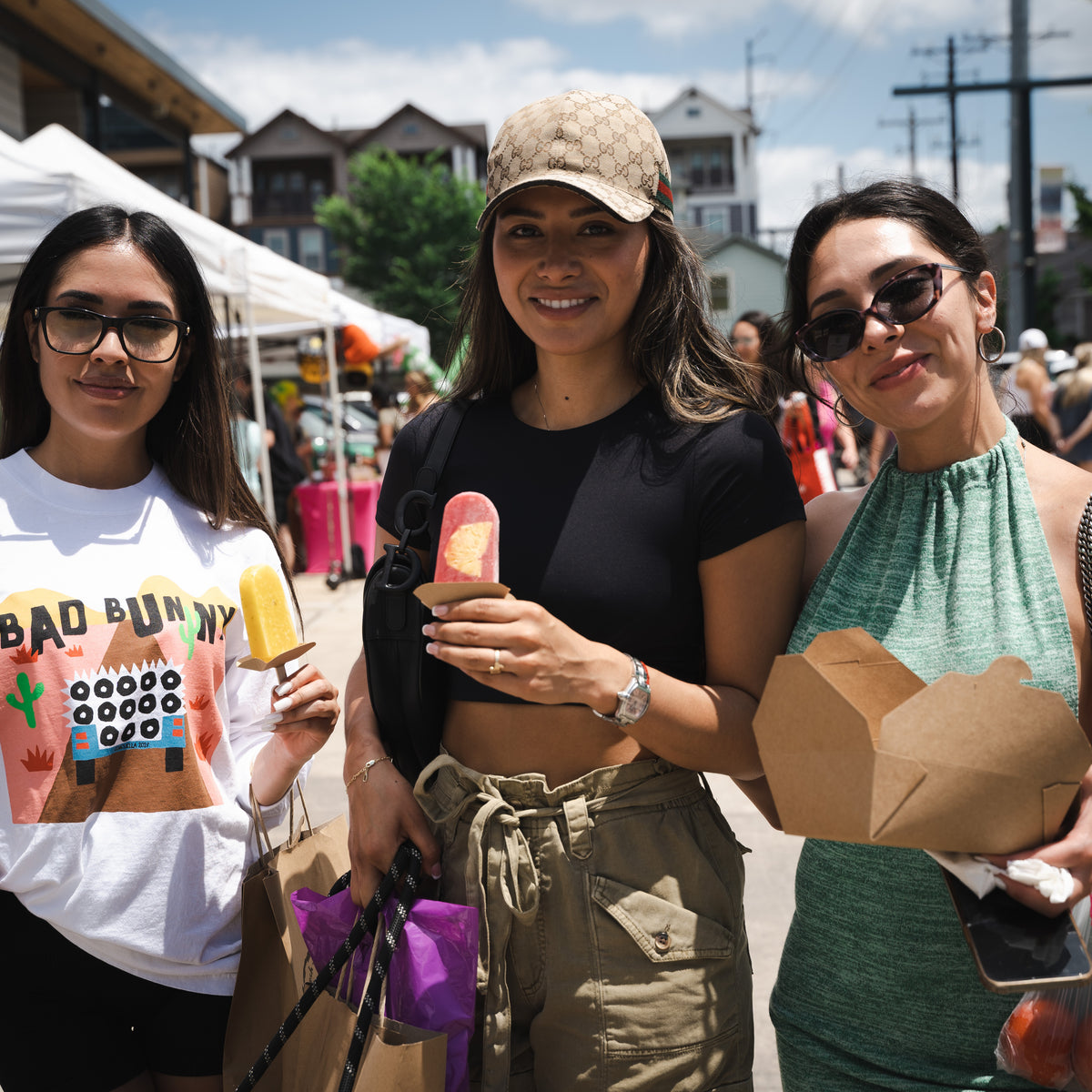Friends having all natural popsicles at Farmers Market.